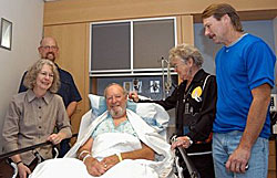 Mr. Chuck Moore with family and friends following a procedure to implant Cesium-131 radioactive seeds.