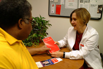 Dr. Sally Weinrich with a patient.